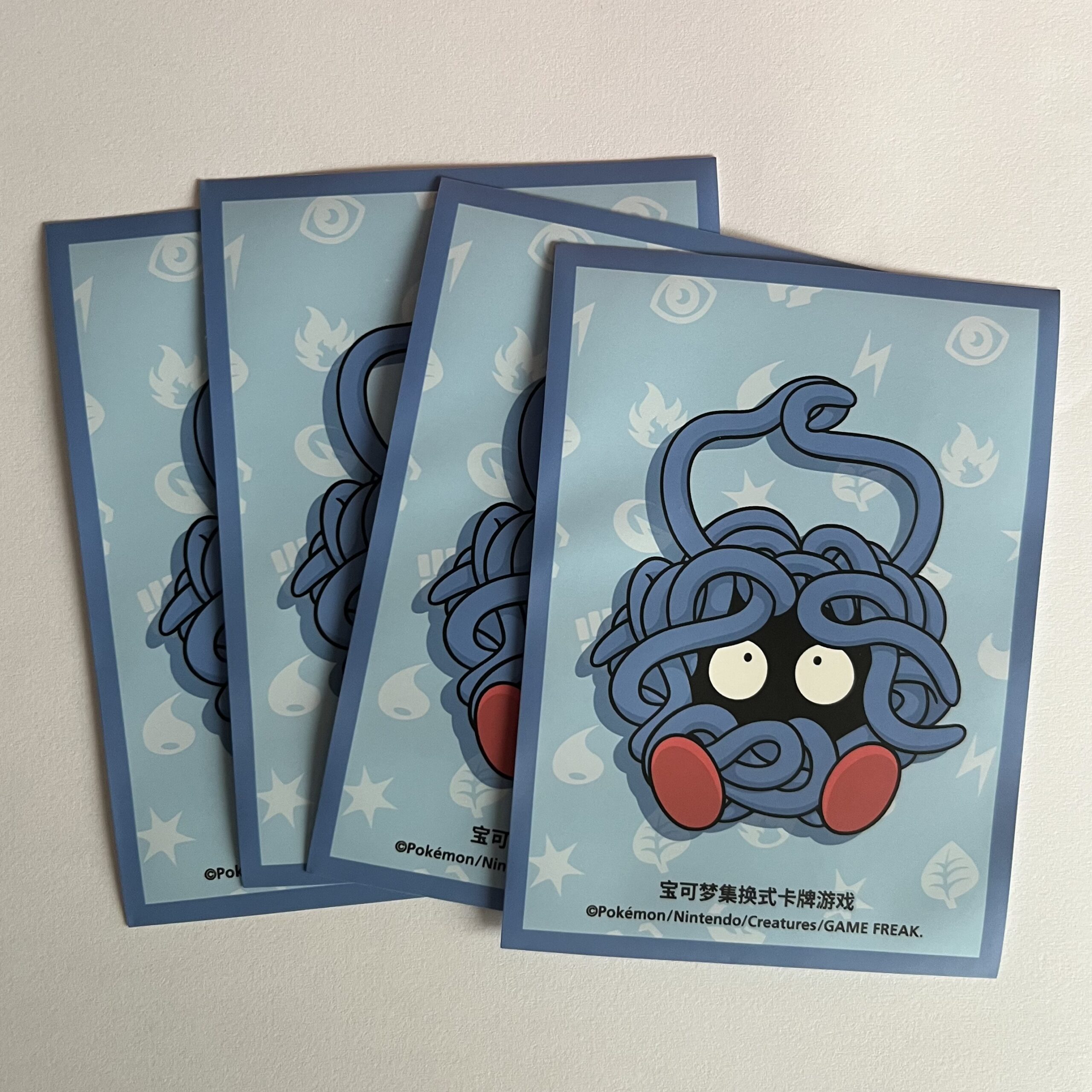 Sleeves Oficiais Pokémon Chinese Exclusive — Tangela (Pack 15)